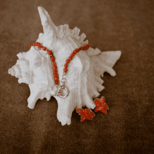 Geknoopte koraal en pyriet collier