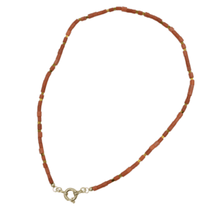 Gouden collier met koraal en pyriet