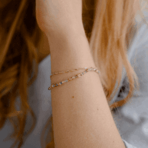 Geknoopt saffier armbandje met roze toermalijn baguette