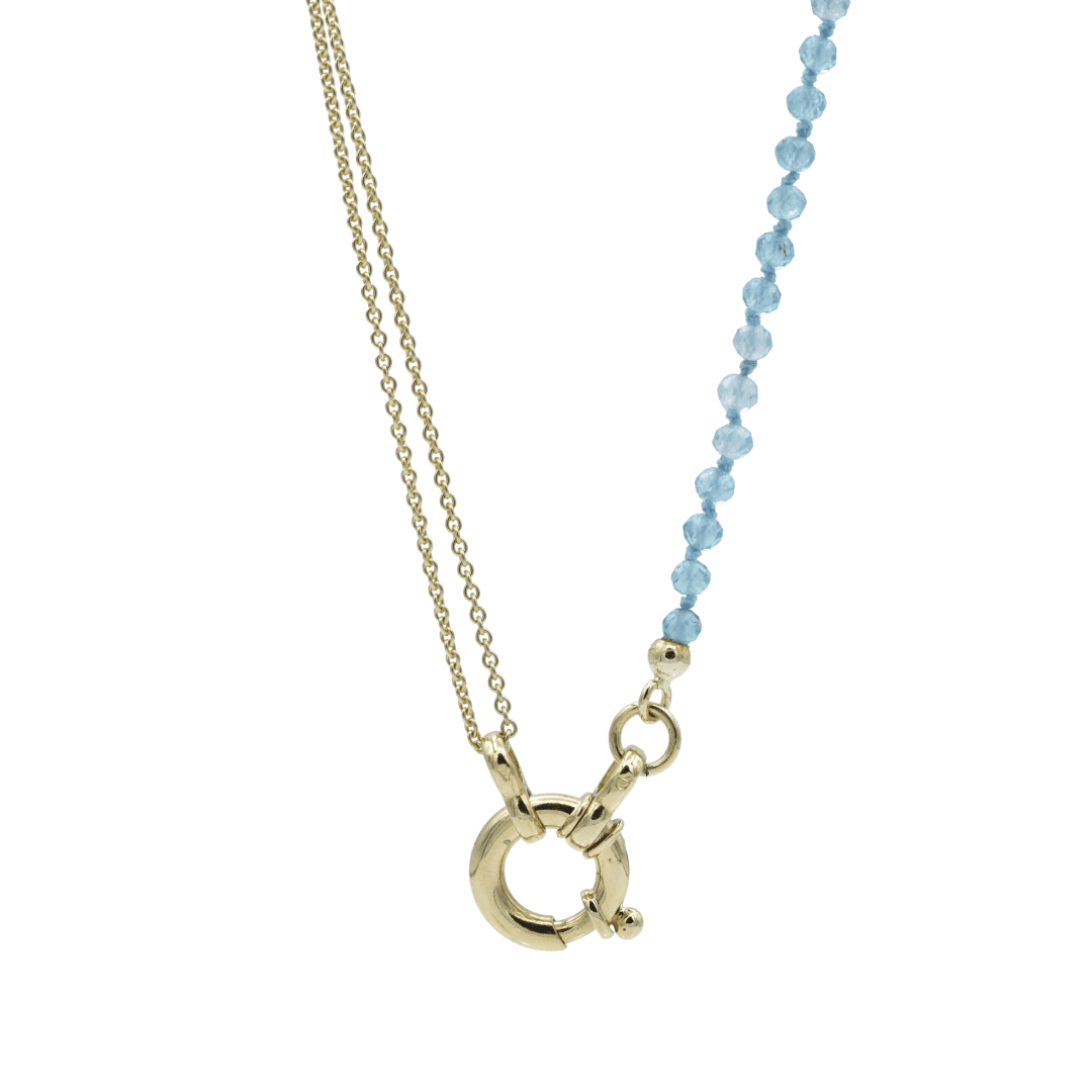 Gouden collier met blauwe zirkoon