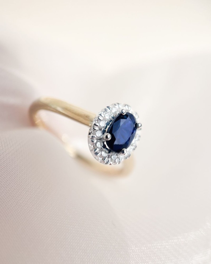 Bicolor ring met saffier en diamant